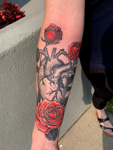 Explore coca cola tattoo ideas, creative tattoo ideas in Mount Clemens, available at Hand & Heart Tattoo