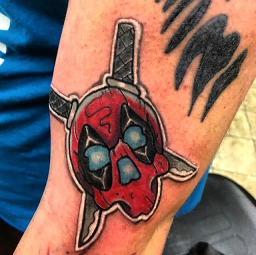 Explore rose and skull tattoo ideas, creative tattoo ideas in Marion, available at Blackbird tattoo gallery