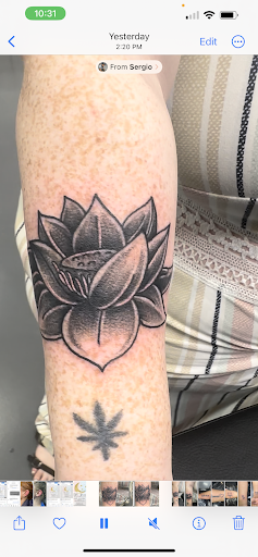 Explore religious elbow tattoo ideas, creative tattoo ideas in Meridian, available at Creative Pain Tattoo Studio