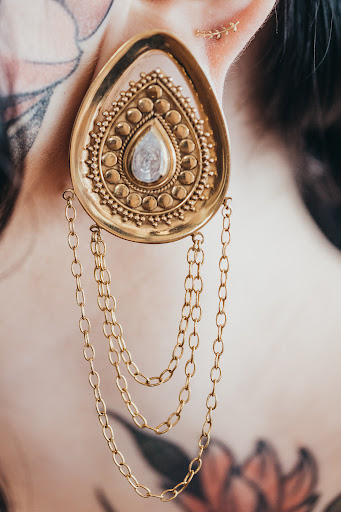 Explore checkered flag tattoo ideas, creative tattoo ideas in Corpus Christi, available at Prestigious Piercing