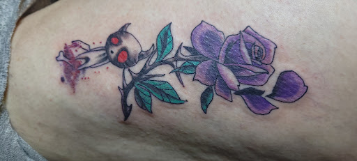 Explore protection tattoo ideas, creative tattoo ideas in Angola, available at Hoodlum Ink