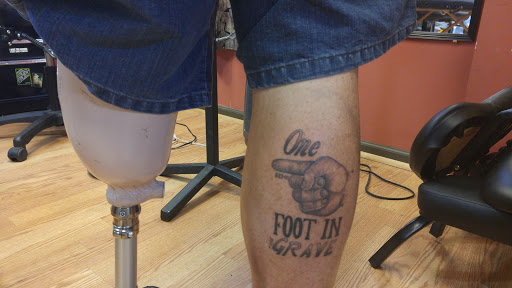 Find earth tattoo ideas for your next unique tattoo in Le Roy at Blood Money Ink