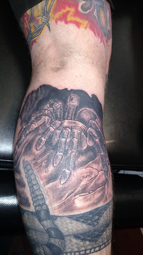 Explore dragonfly flower tattoo ideas, creative tattoo ideas in Burlington, available at Tiny Tims Tattoo Shop