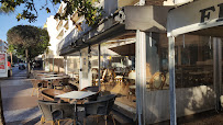 Atmosphère du Restaurant français Bar Les Palmiers à Cavalaire-sur-Mer - n°1