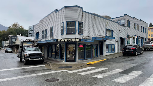 Explore colorful flower tattoo ideas, creative tattoo ideas in Juneau, available at High Tide Tattoo