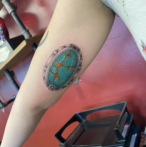 Explore spine tattoo ideas for females, creative tattoo ideas in Idaho Falls, available at Sinner Tattoo Studio