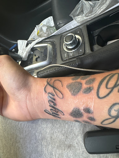Explore neck tattoo ideas woman, creative tattoo ideas in Auburndale, available at Till Death Tattoo Studio