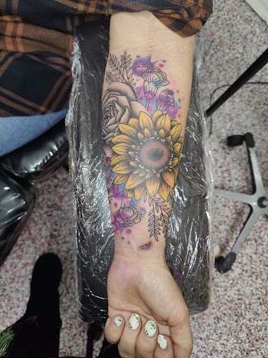 Explore real madrid tattoo ideas, creative tattoo ideas in Rogers, available at Jimmy Romance Tattoo & Body Piercing