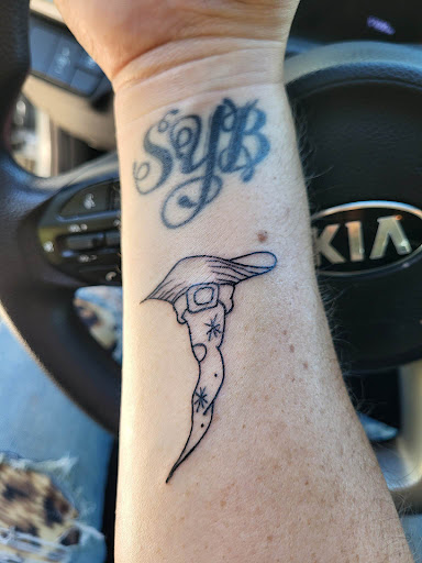 Explore prayer tattoo ideas, creative tattoo ideas in Lake City, available at Crooked Spines Tattoo Studio