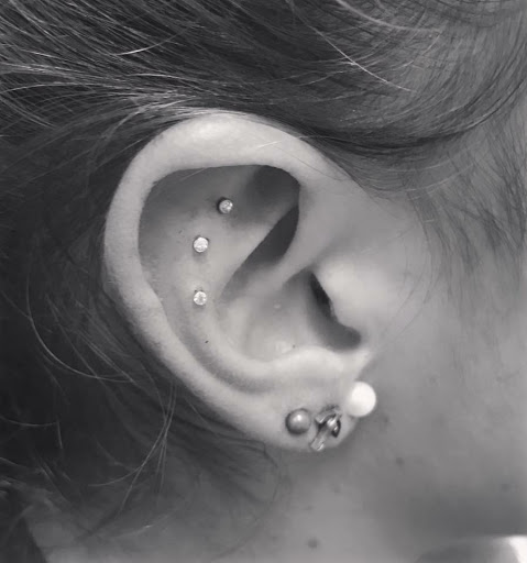Explore hand tattoo ideas man, creative tattoo ideas in Fort Walton Beach, available at Piercings by Torrie