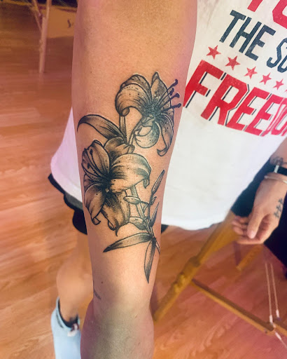 Explore thigh piece tattoo ideas, creative tattoo ideas in Gautier, available at Voodoo Tattoo