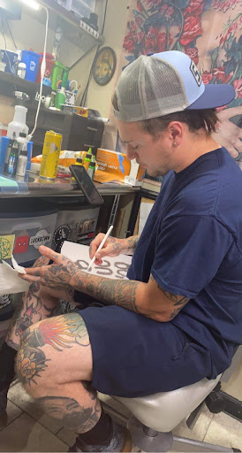 Explore tattoo flower ideas, creative tattoo ideas in Erie, available at Code of Honor Tattoo