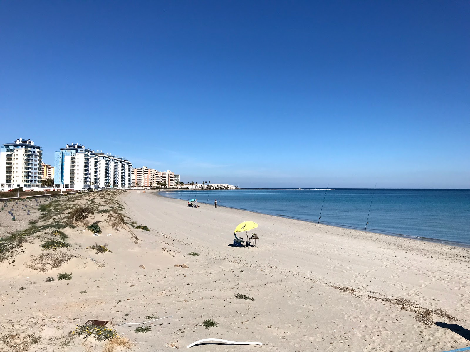 Fotografija Playa del Pudrimel z svetel pesek površino
