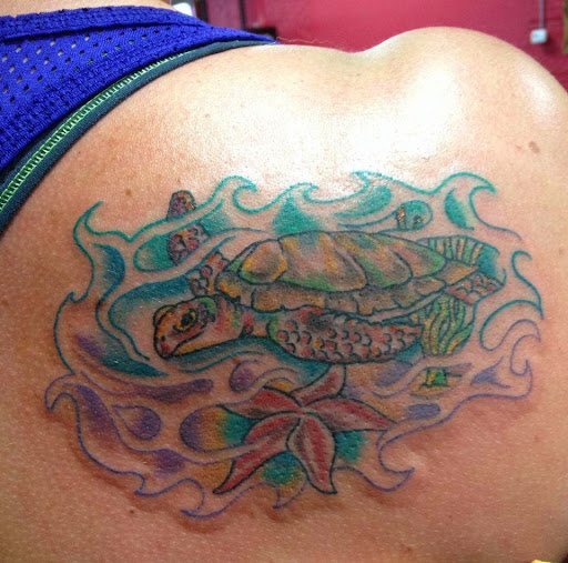 Explore wrist cover up tattoo ideas, creative tattoo ideas in Martinsburg, available at 100 Proof Tattoo