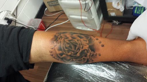 Explore deftones tattoo ideas, creative tattoo ideas in Davenport, available at Unique Ink Art Studio