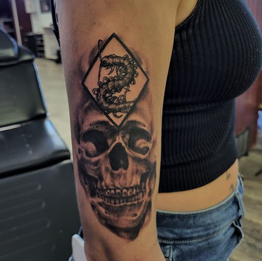 Explore motley crue tattoo ideas, creative tattoo ideas in Clinton, available at Black Relic Tattoo