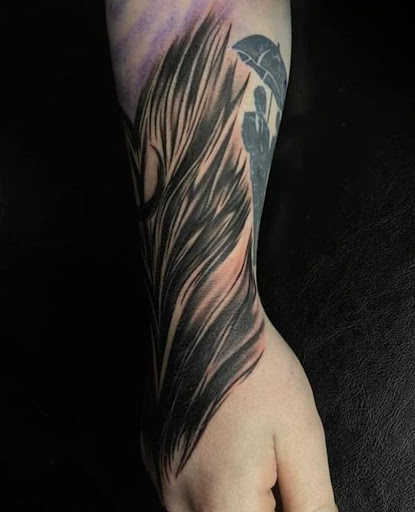 Explore bass fish tattoo ideas, creative tattoo ideas in Lake Villa, available at Eternal Tiger Tattoo