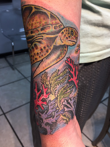 Explore grace tattoo ideas, creative tattoo ideas in Neptune, available at Neptune Tattooville