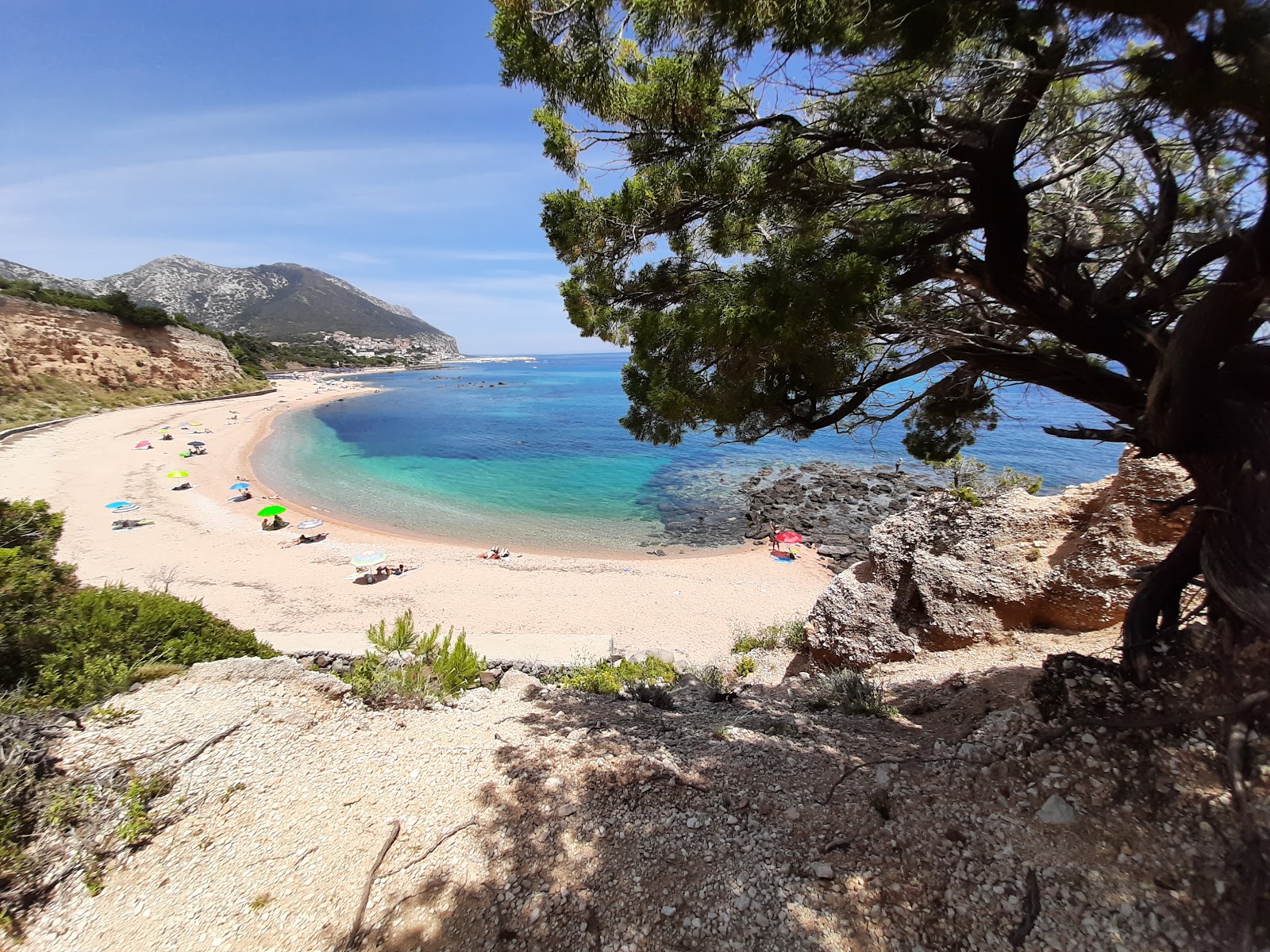 Foto av Palmasera beach med turkos rent vatten yta