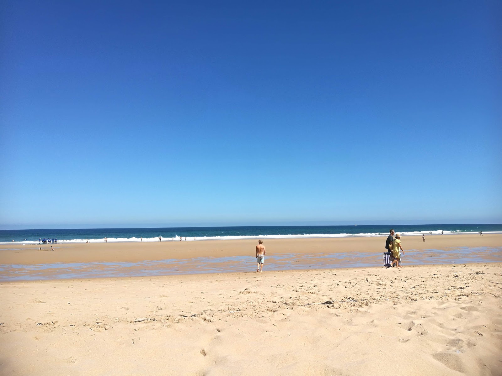 Fotografija Playa de Langre z prostoren zaliv