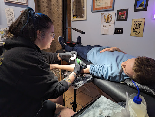 Explore male family tattoo ideas, creative tattoo ideas in Saint Augustine, available at Ms. Deborahs Fountain of Youth Tattoo & Body Piercing