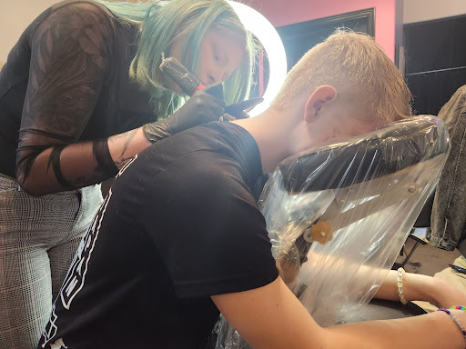 Find garter belt tattoo ideas for your next unique tattoo in Clearfield at Platypus Tattoo Co.