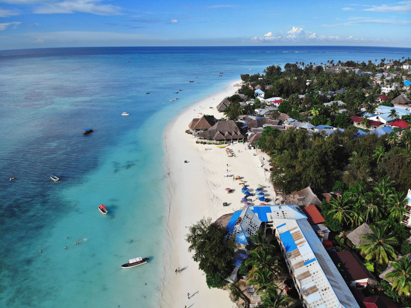 Photo of Nungwi Beach with white fine sand surface