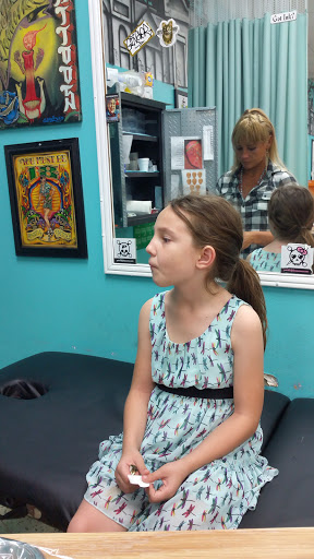 Explore hourglass tattoo ideas, creative tattoo ideas in New Orleans, available at Mid City Voodoux Tattoos