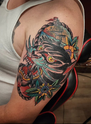 Explore belle tattoo ideas, creative tattoo ideas in Cedar Falls, available at The Iron Quill Tattoo Parlor