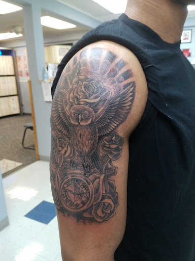 Explore cartoon tattoos ideas, creative tattoo ideas in Libertyville, available at Art With Atattooed