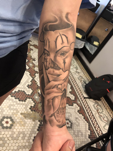 Explore crucifix tattoo ideas, creative tattoo ideas in Junction City, available at New Era Tattoo Studio