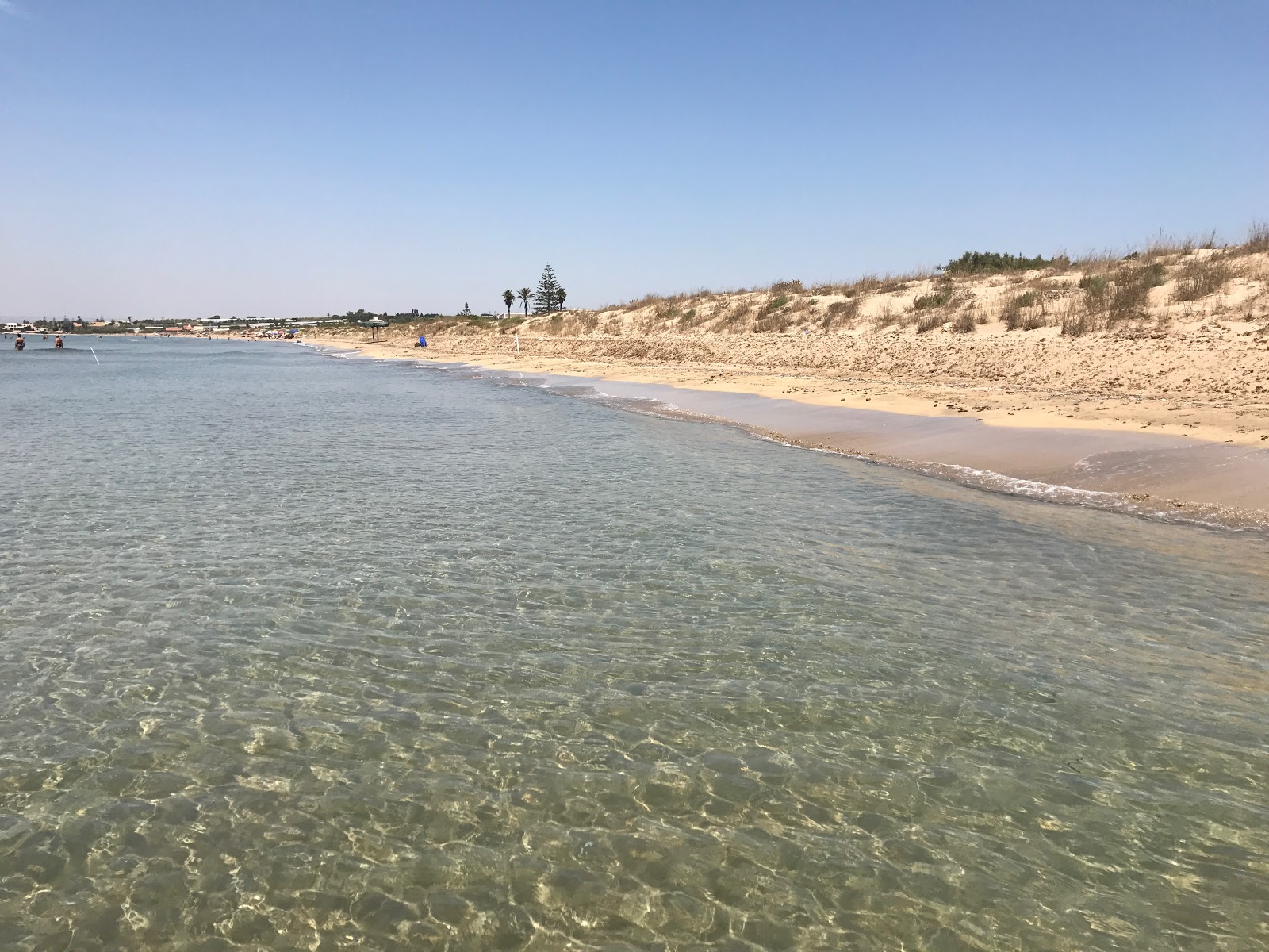 Foto af Spiaggia Scarpitta med brunt sand overflade