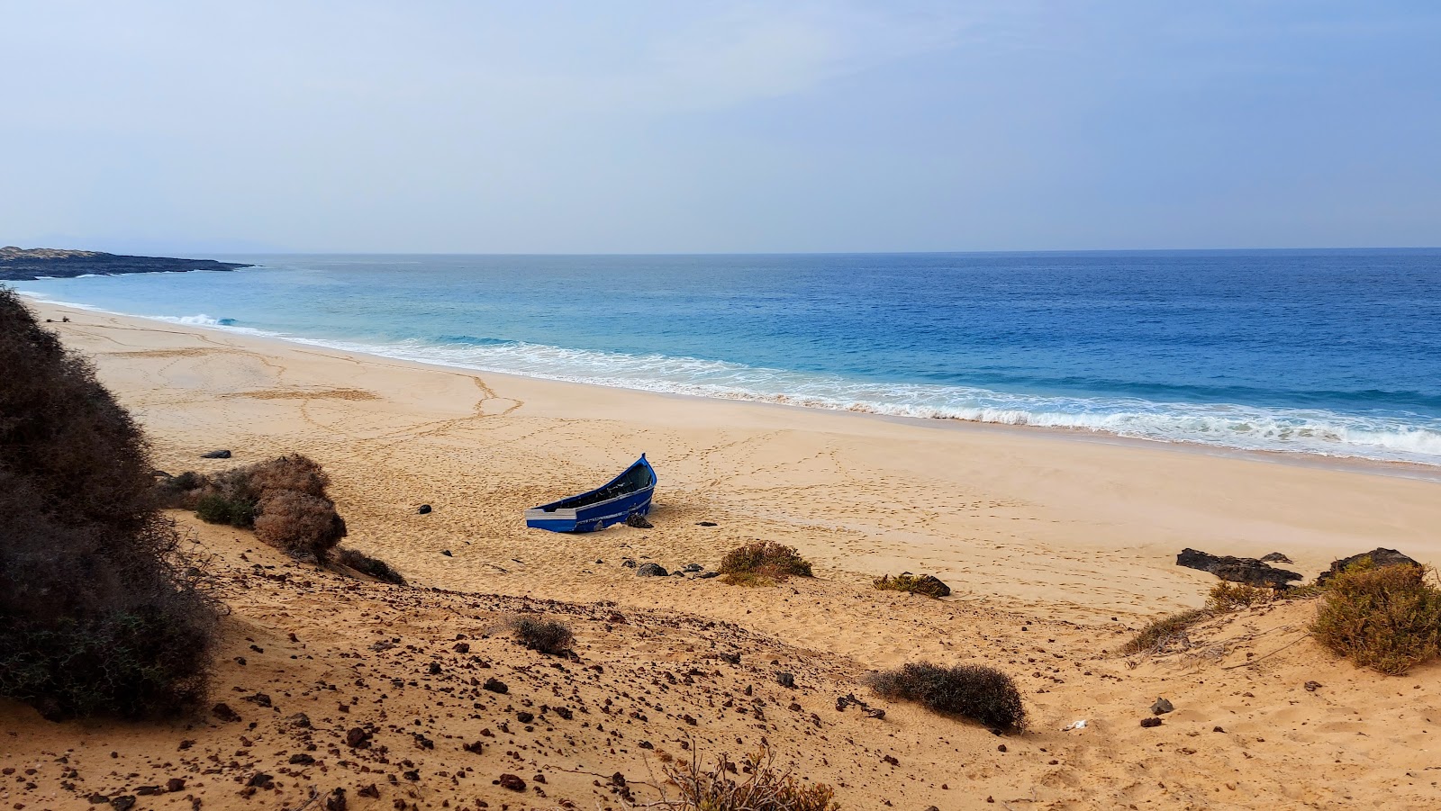 Foto di Playa de las Conchas - luogo popolare tra gli intenditori del relax