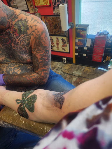 Explore two face tattoo ideas, creative tattoo ideas in Madisonville, available at Mainstream Body Art