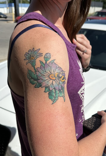 Explore snowmobile tattoo ideas, creative tattoo ideas in Oklahoma City, available at Chrome Dragon Tattoo