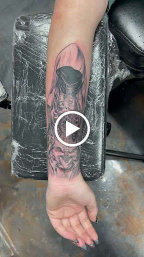 Explore black female tattoos ideas, creative tattoo ideas in New Baltimore, available at Altered Ego Tattoo Studio