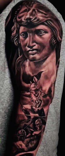 Find alpha and omega tattoo ideas for your next unique tattoo in Austin at Lost Edge Tattoo