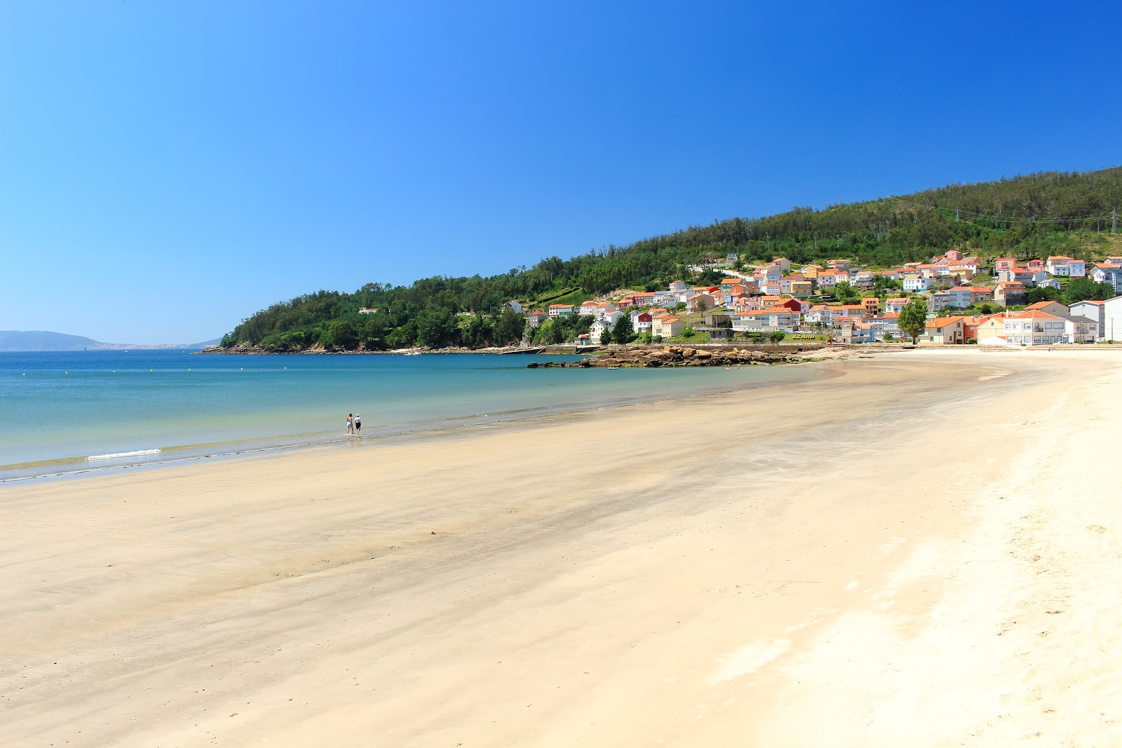 Foto di Praia do Ezaro con una superficie del sabbia bianca