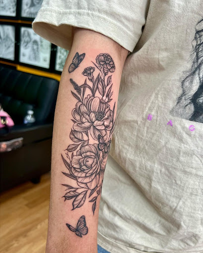 Explore tattoo ideas for swimmers, creative tattoo ideas in Ambler, available at Tattoo GalaxyAmbler Piercing & Custom Tattoos