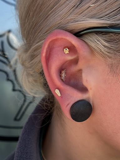 Explore floral tattoo cover up ideas, creative tattoo ideas in Salem, available at Thistle Piercing & Fine Jewelry