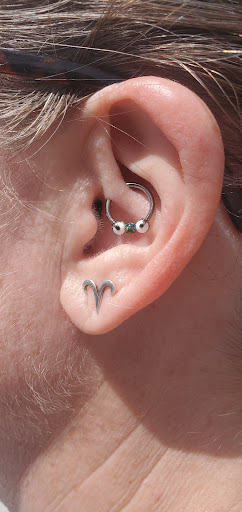 Explore february birth tattoo ideas, creative tattoo ideas in Reno, available at Black Hole Body Piercing