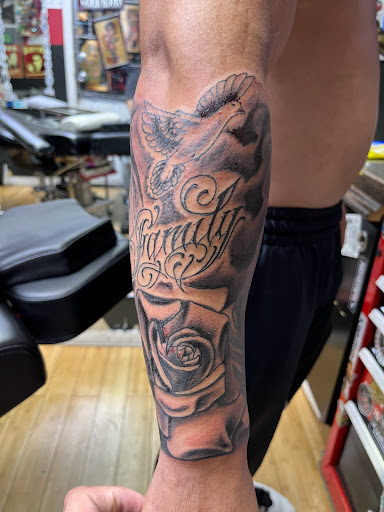 Explore snoopy tattoo ideas, creative tattoo ideas in Newark, available at Bad Intentionz Tattoo & Piercings Studio