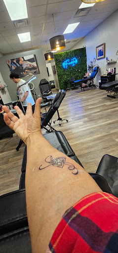 Explore arch angel tattoo ideas, creative tattoo ideas in Davenport, available at Fine Ink Studios Tattoos