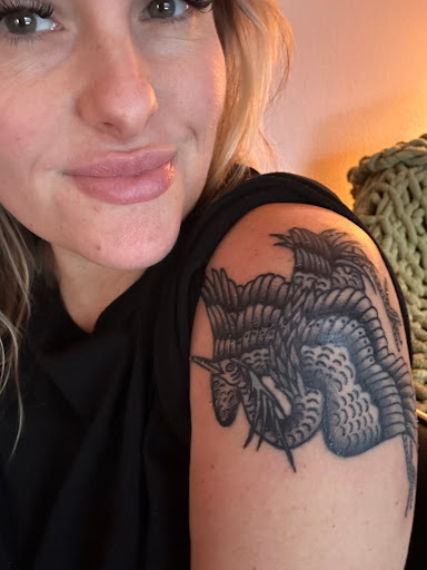 Explore purple rose tattoo ideas, creative tattoo ideas in Tulsa, available at Dire Wolf Tattoo