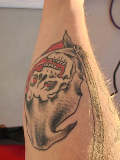 Explore throat tattoo ideas for males, creative tattoo ideas in Russell, available at AU Tattoo