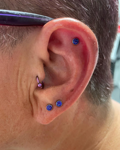 Explore cool sleeve tattoo ideas for guys, creative tattoo ideas in Worcester, available at Elegance Piercing & Tattoo Inc.