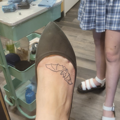 Explore sweet pea tattoo ideas, creative tattoo ideas in Warner Robins, available at Untold Pain Tattoo Studio