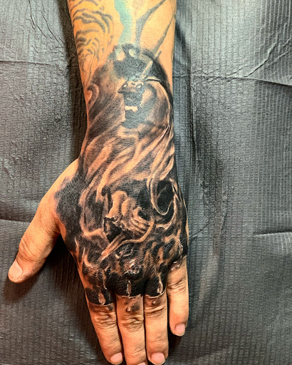 Explore tattoo ideas for hair stylist, creative tattoo ideas in New York, available at Redink Tattoo Studio