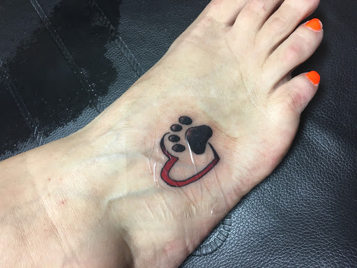 Explore flag tattoo ideas, creative tattoo ideas in Gladewater, available at Hillies Appointment Only