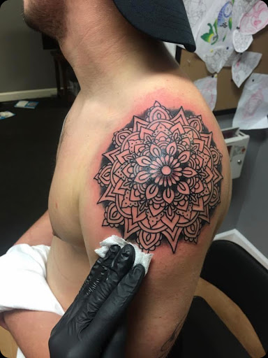 Explore tattoo ideas for first born, creative tattoo ideas in Goose Creek, available at Red Kirin Tattoo